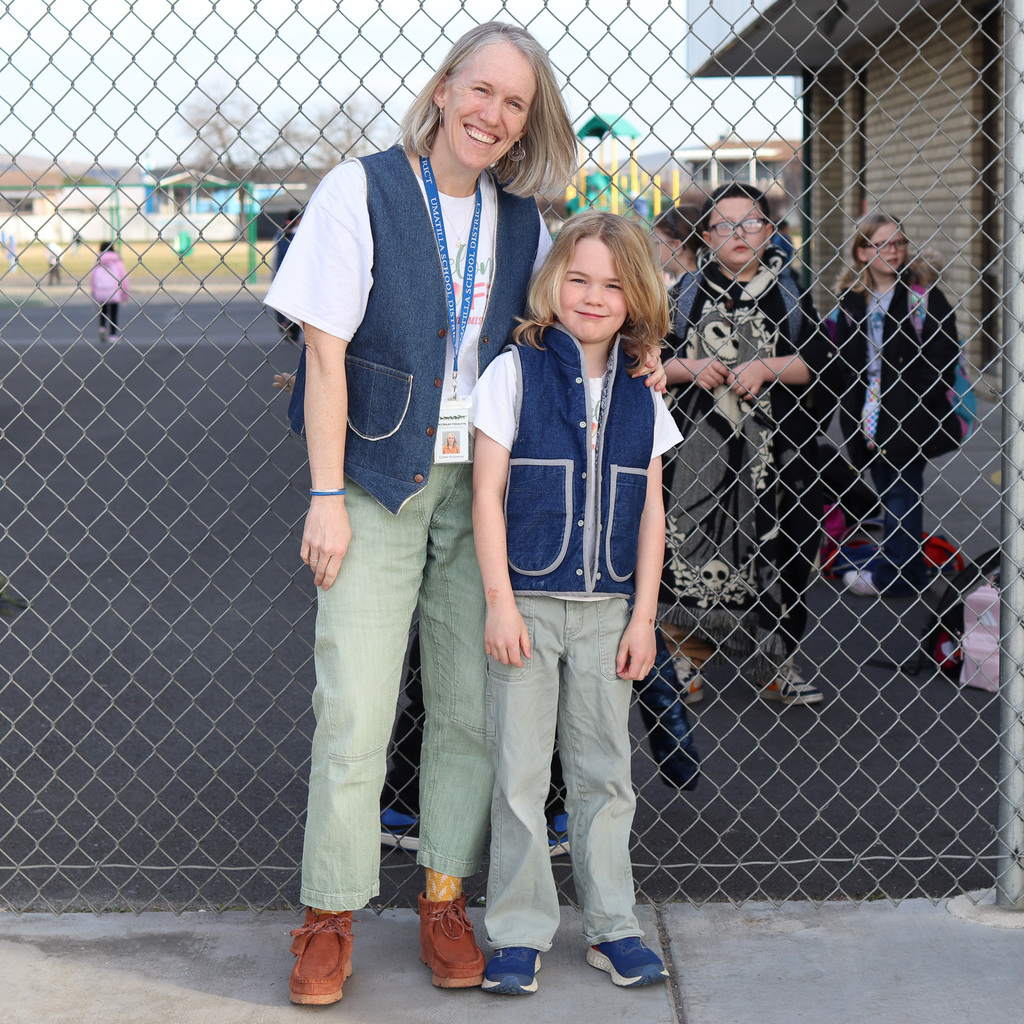 student and teacher dressed as twins