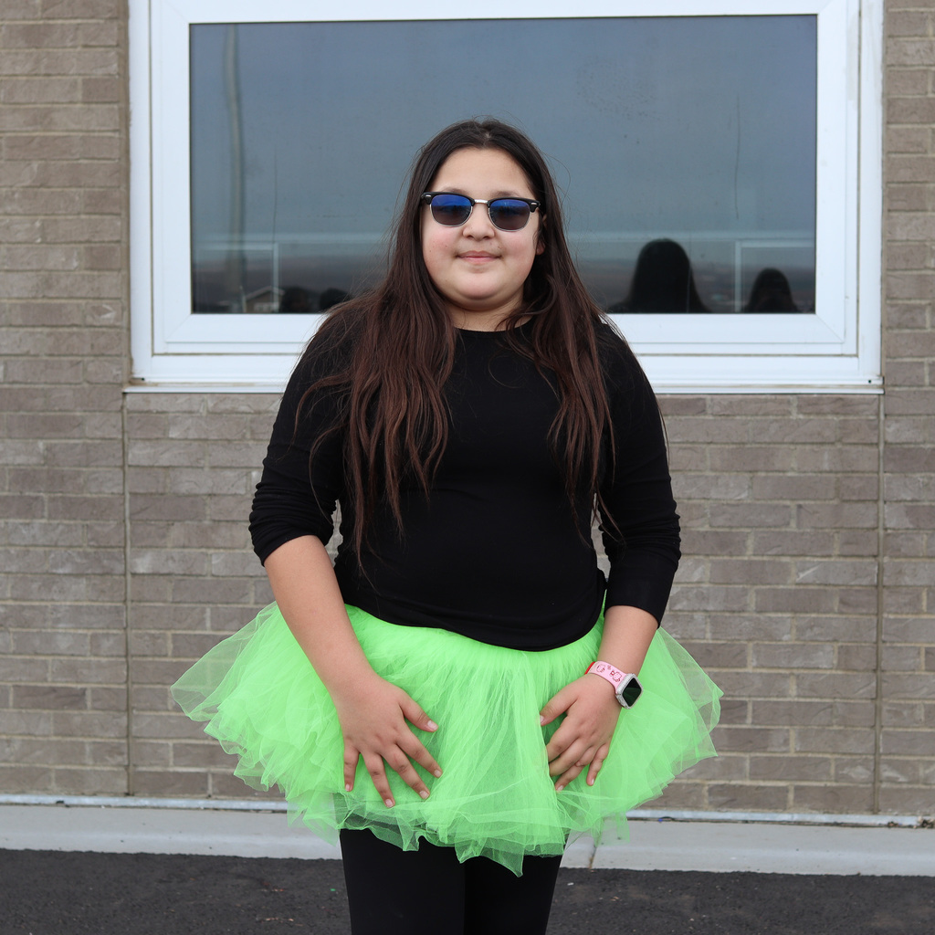 student wearing green