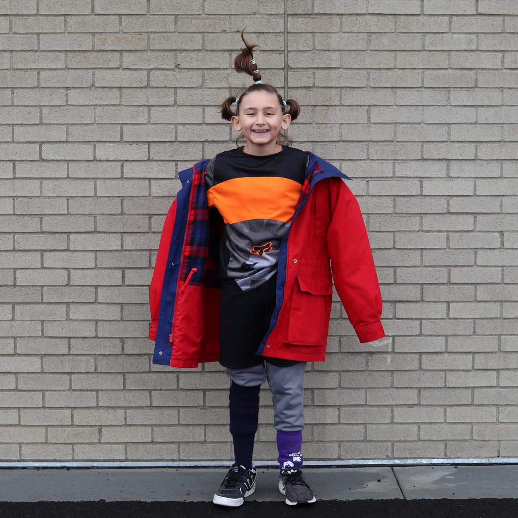 student with crazy hair and clothes