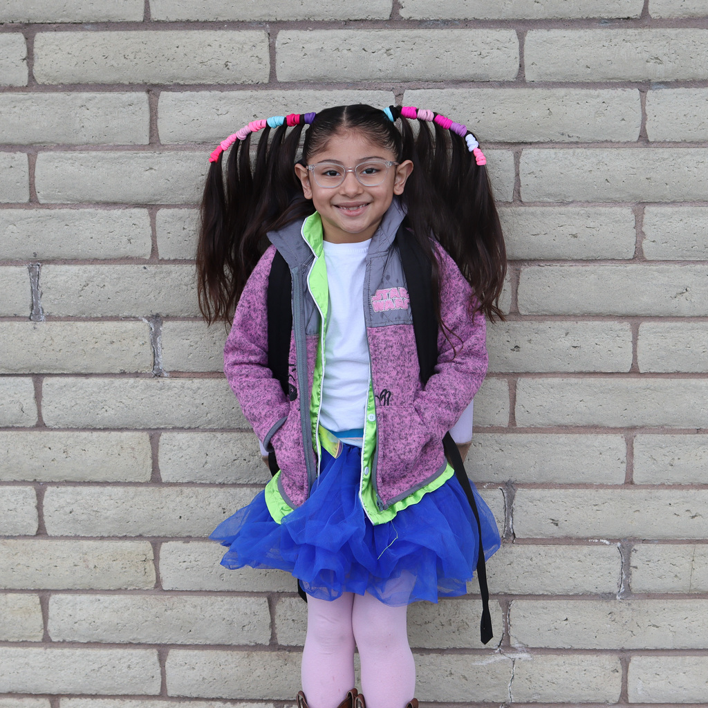 student with crazy hair and clothes