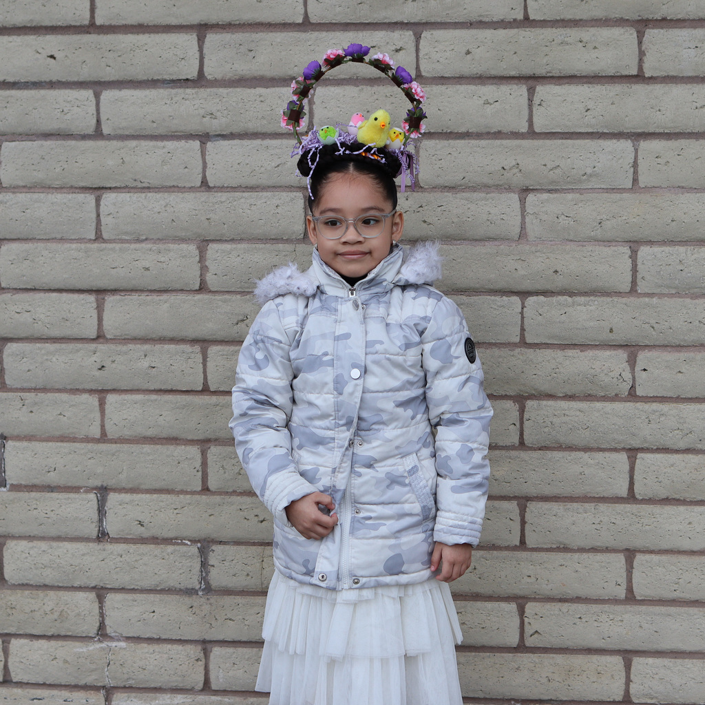 student with crazy hair