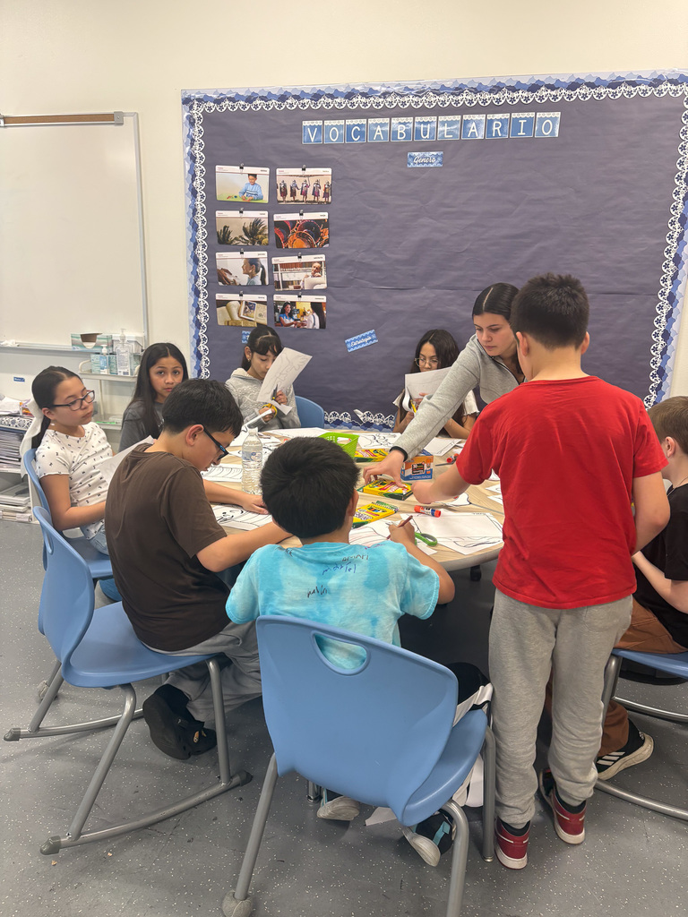 High School student reading to students