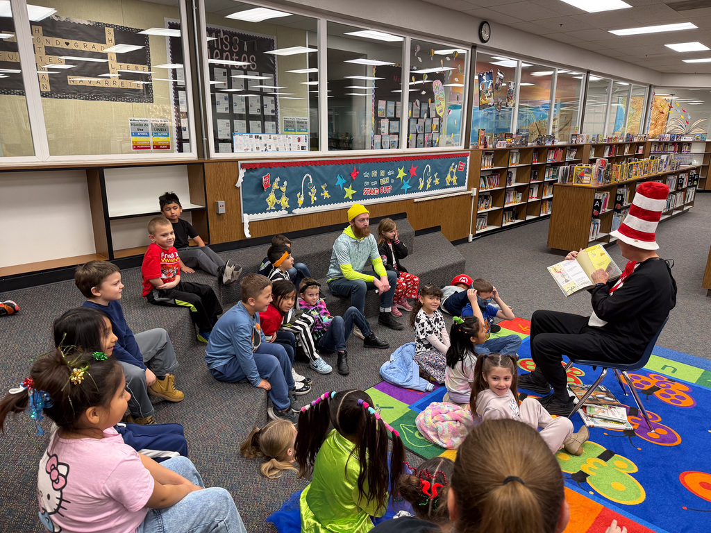 The Cate in the Hat Reading to students 