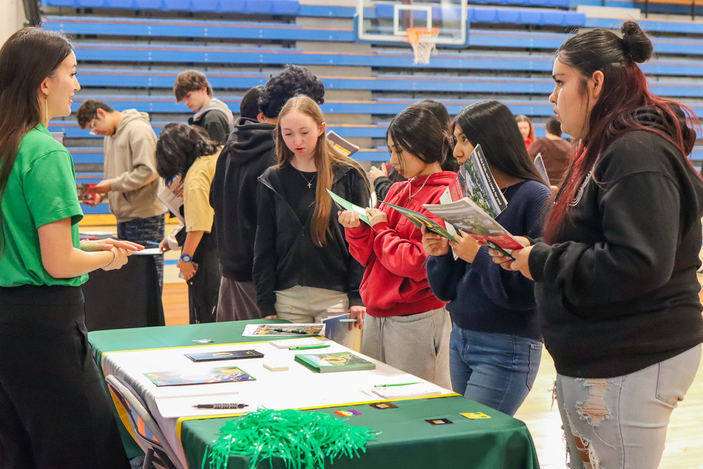 University of Oregon's representative speaking with students 