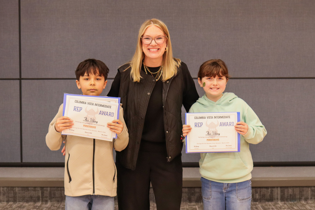 Photo of Mrs. Hernandez's students receiving REP Awards