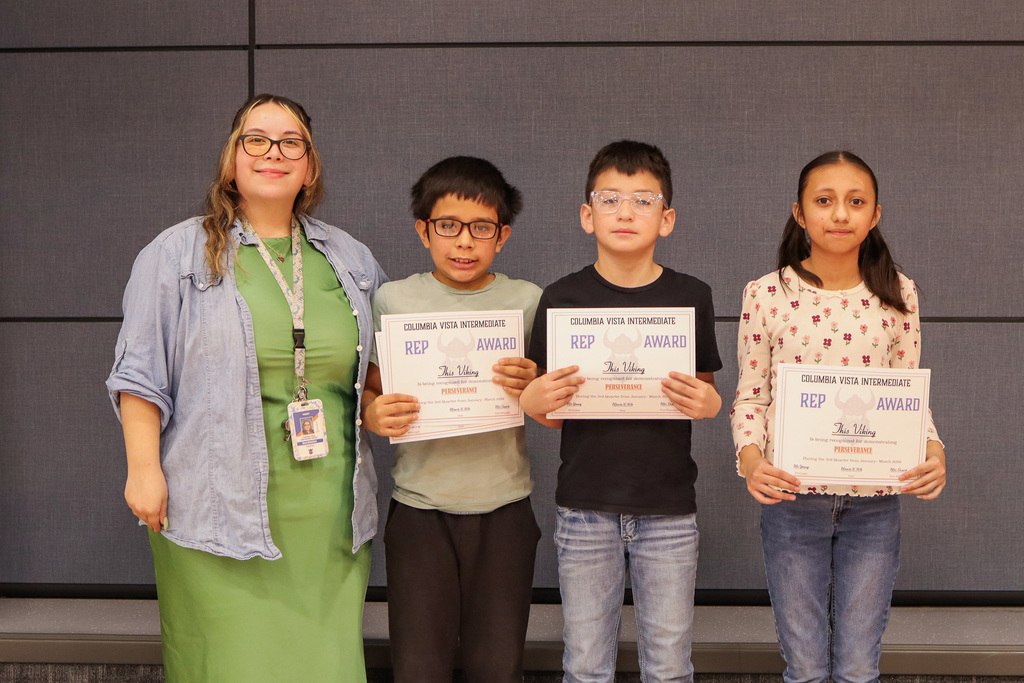 Photo of Ms. Mendoza's students receiving REP Awards