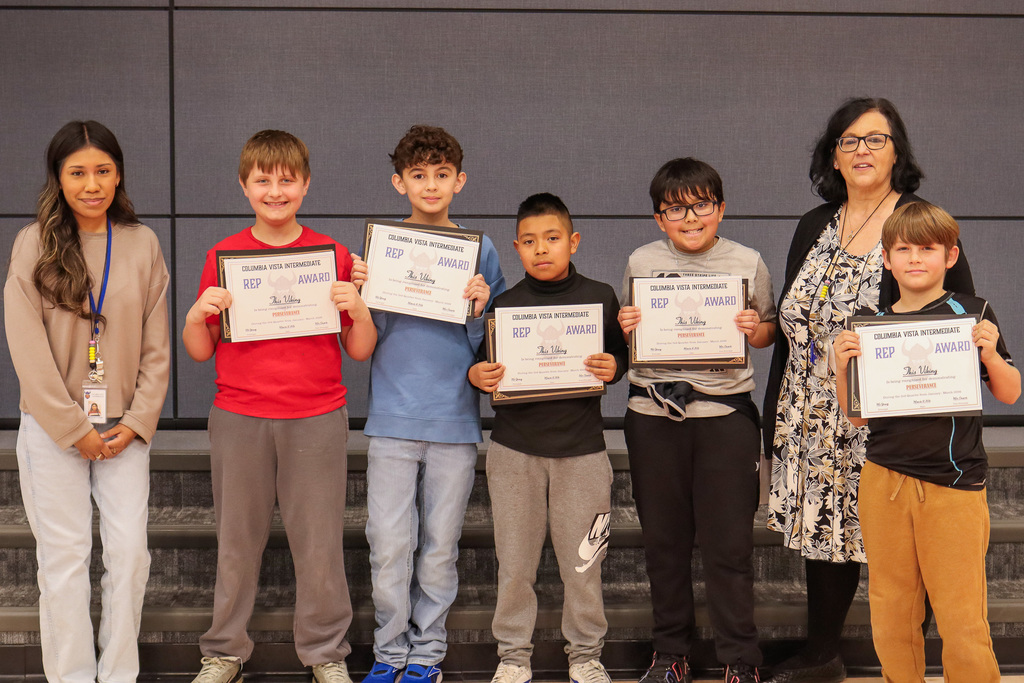 Photo of Mrs. Estrella's students who received REP Awards 