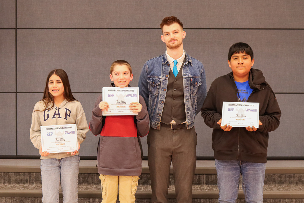 Photo of Mr. Storagee's 6th grade students receiving REP Award