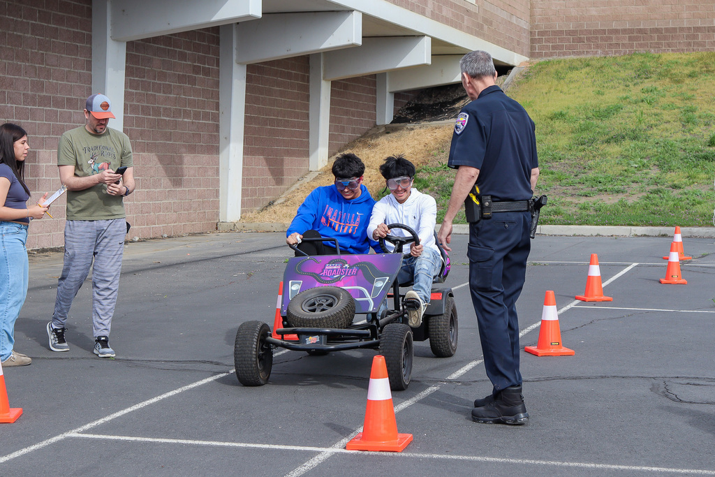 students steering the pedal bike