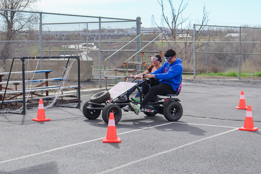 students steering the pedal bike