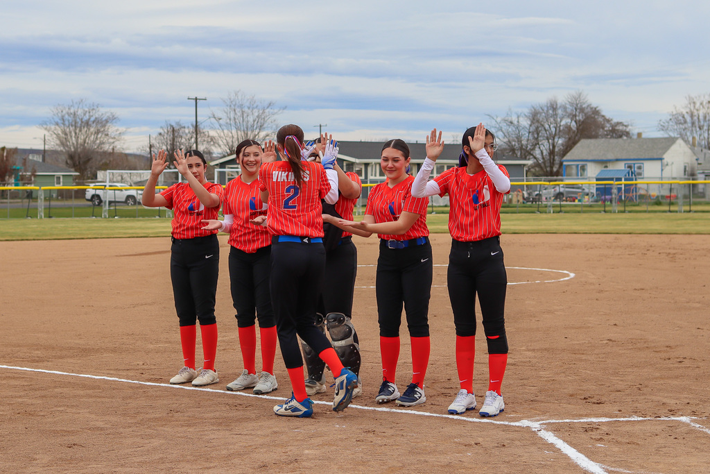 UHS team high-fiving teammate