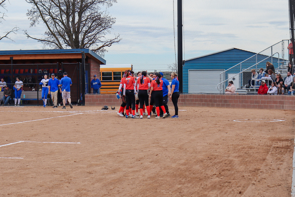 UHS team huddled up for team cheer 