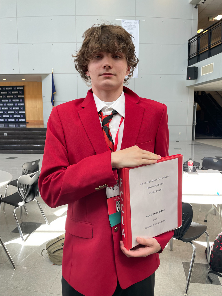 Junior Owen with his Career Investigation Binder 