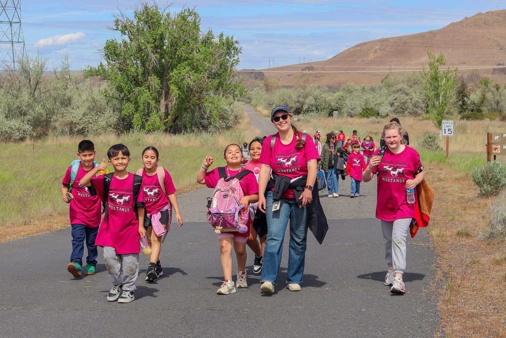 Students walking down a trail 