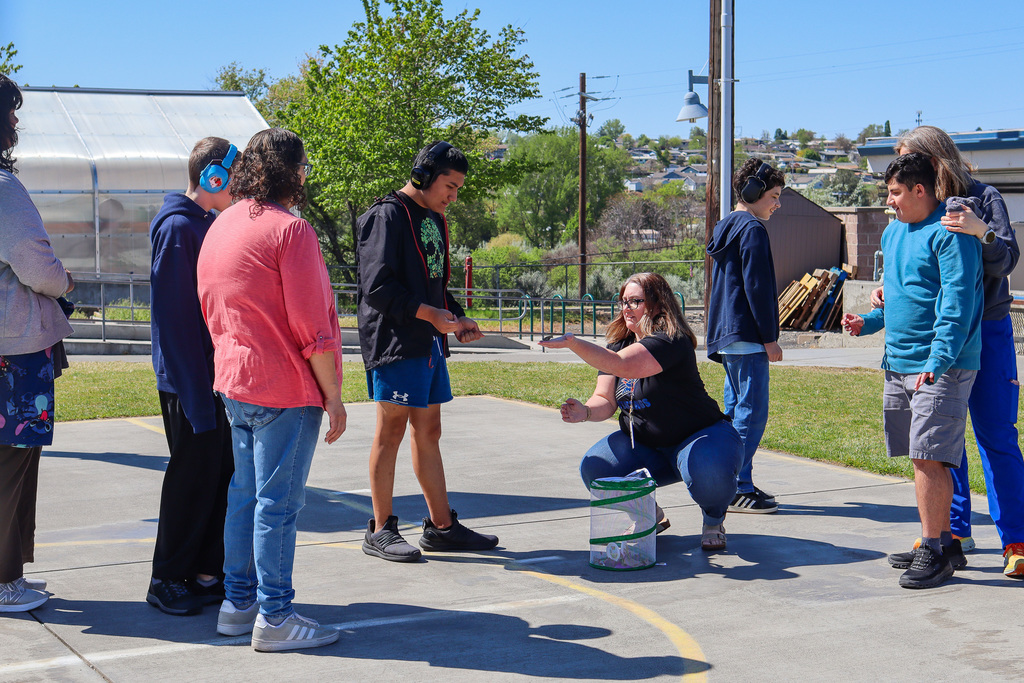 Students and Mrs. Pankratz releasing the butterflies 