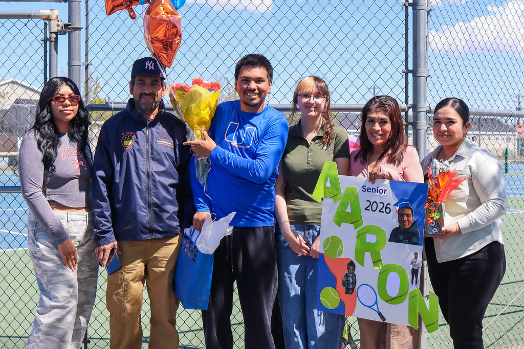 photo of senior with family members 