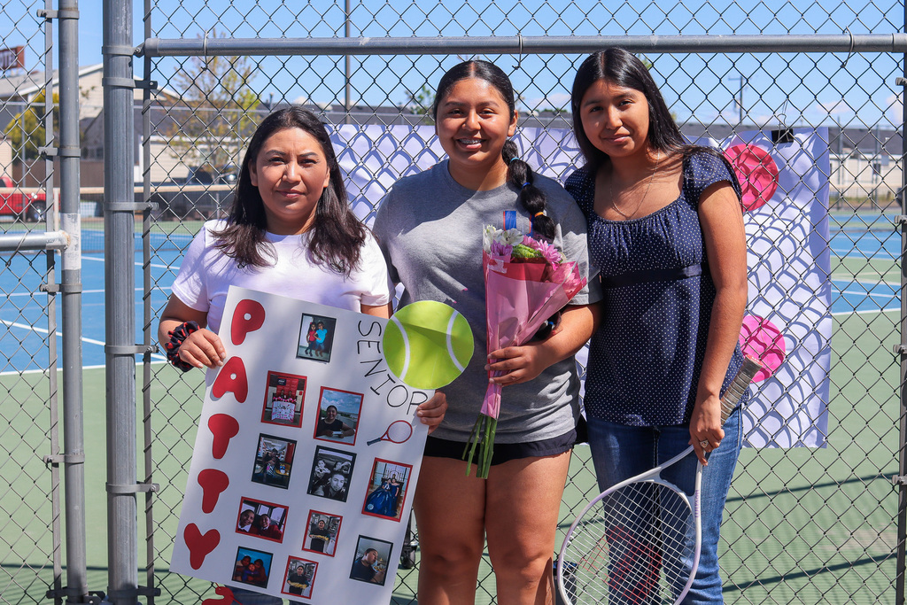 photo of senior with family members 