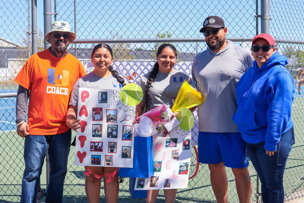 Photo of senior girls tennis athletes with coaches 
