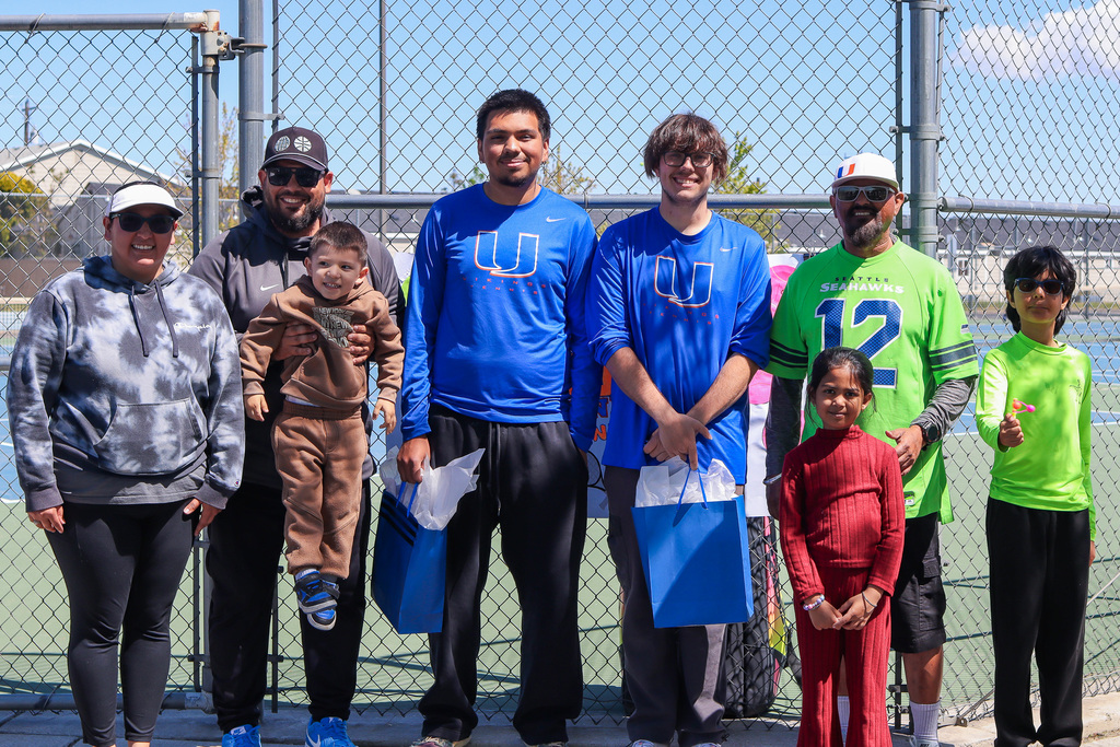 Photo of senior boy tennis athletes with coaches 