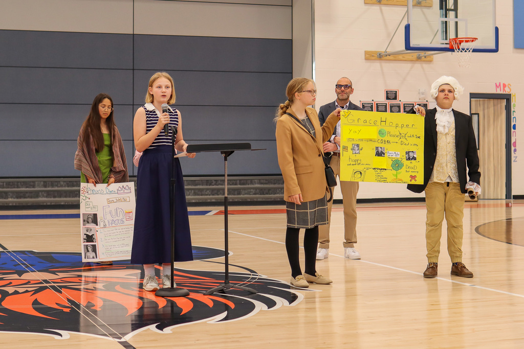 Student giving speech to entire 4th and 5th grade class 