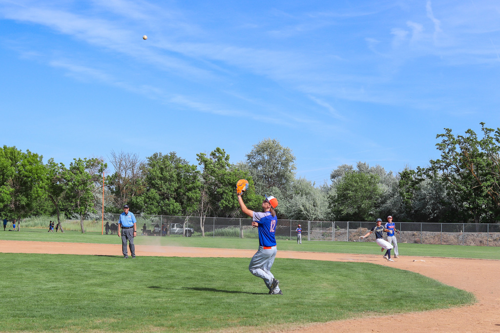 senior #12 preparing to catch the ball 