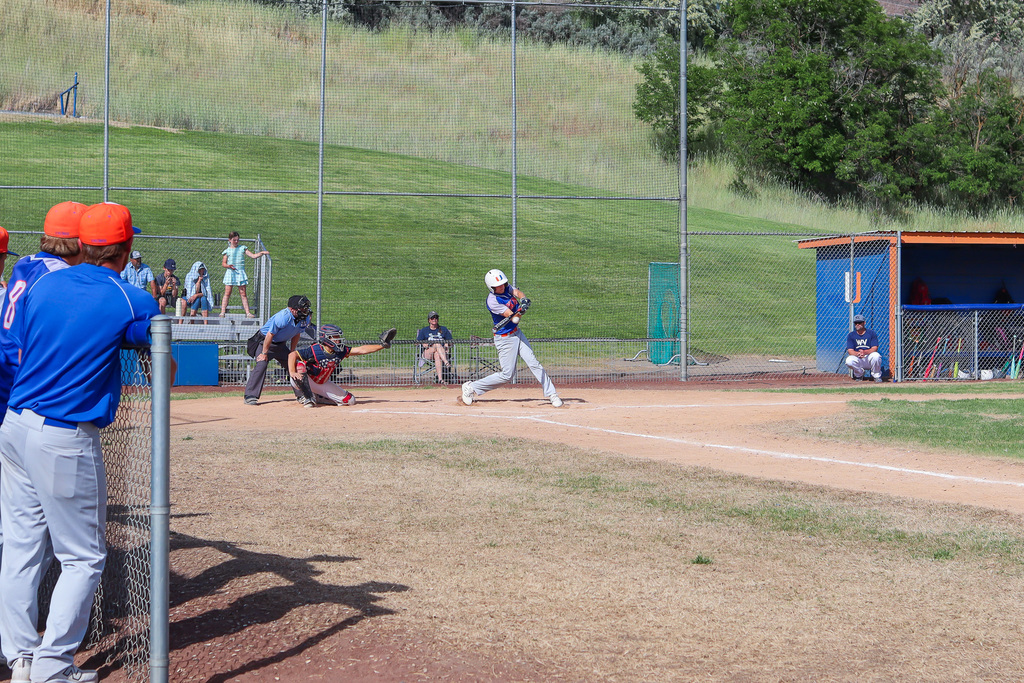 Umatilla Baseball player swings at a pitch during the game