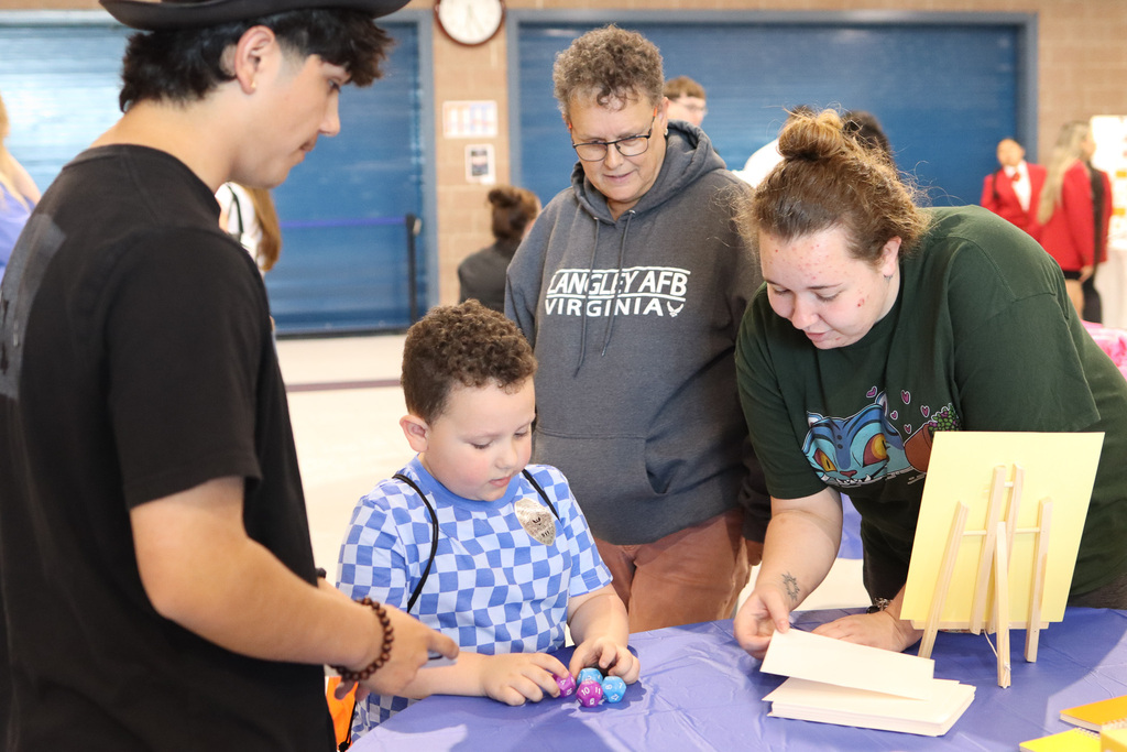 Student playing fun dice game 