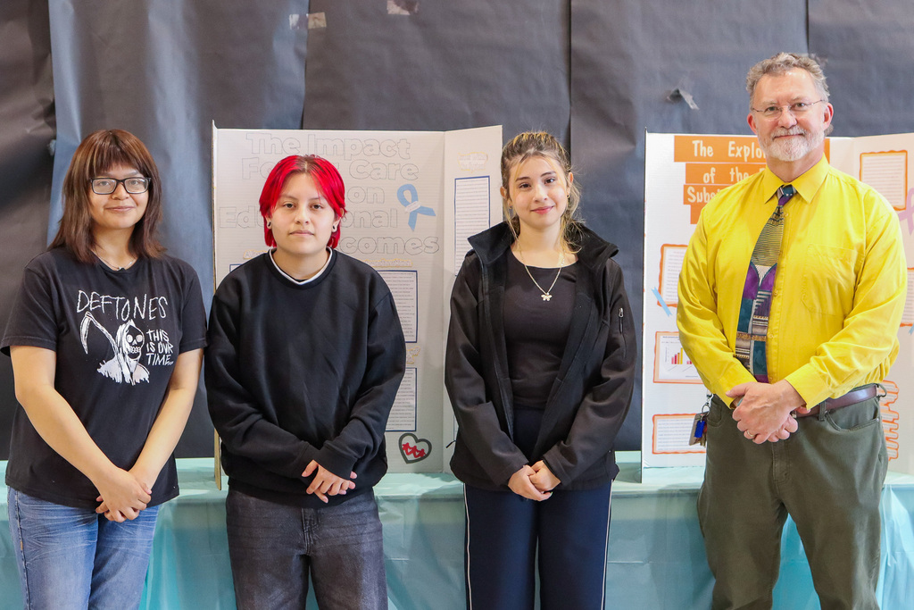 Mr. Early pictured with his intro to education students 