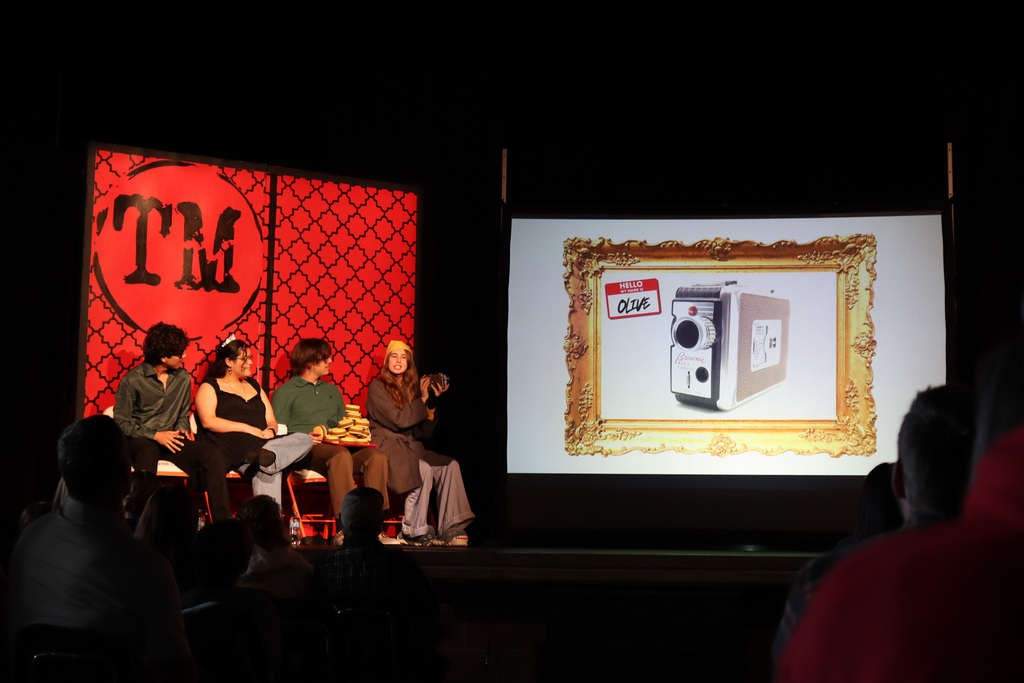 Contestants showing what gift item they brought from home