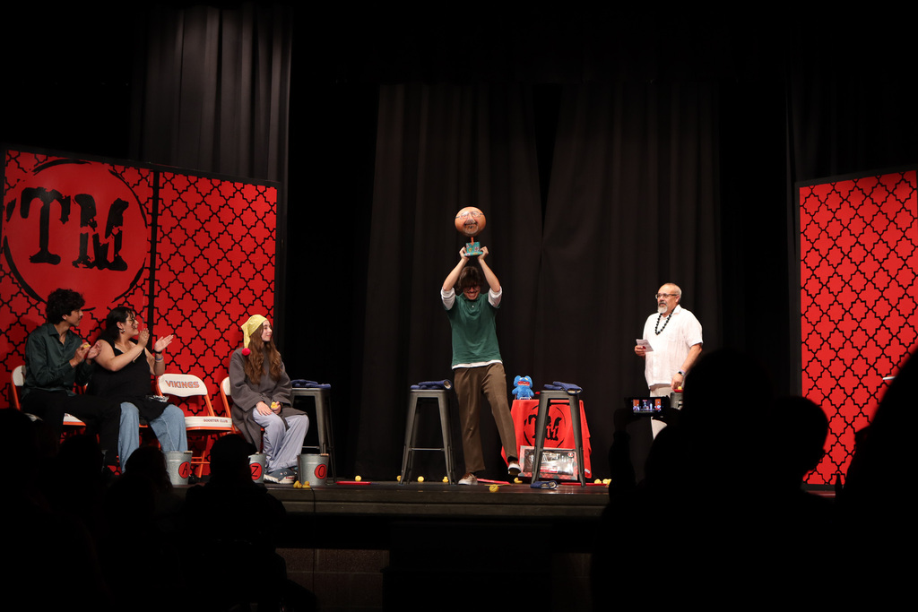 Contestant Xander winning the game show