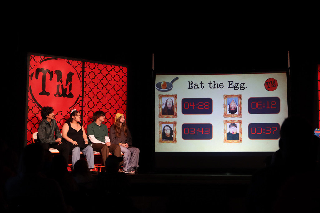 Board showing how many minutes/seconds contestants were able to eat an egg in