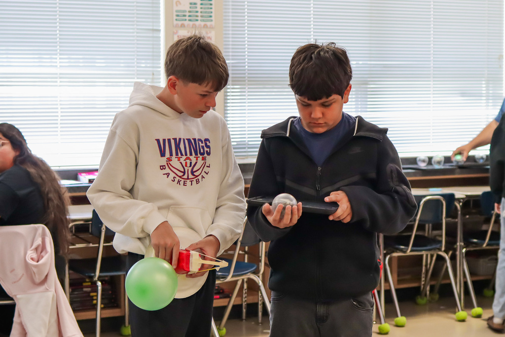 Students constructing their battle bot