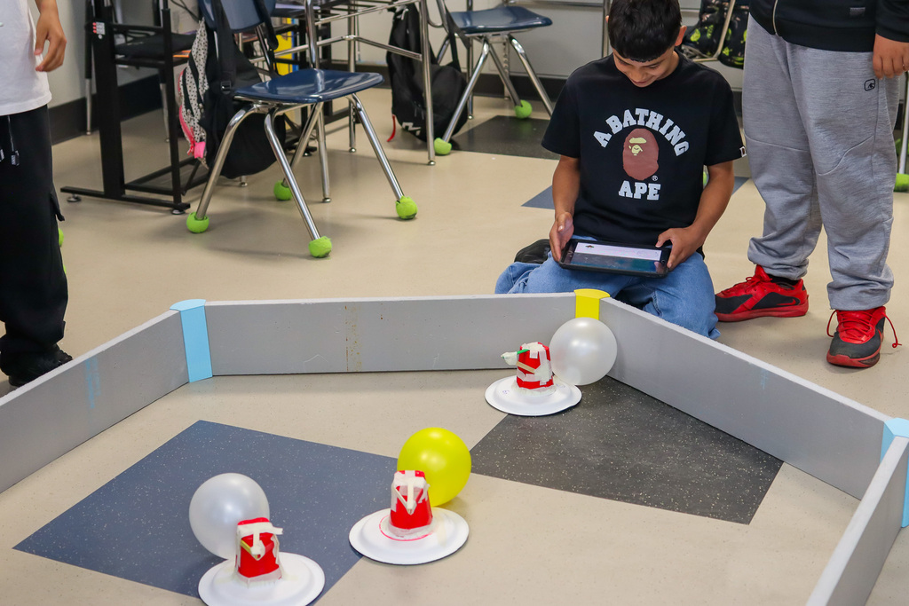 student driving their battle bot