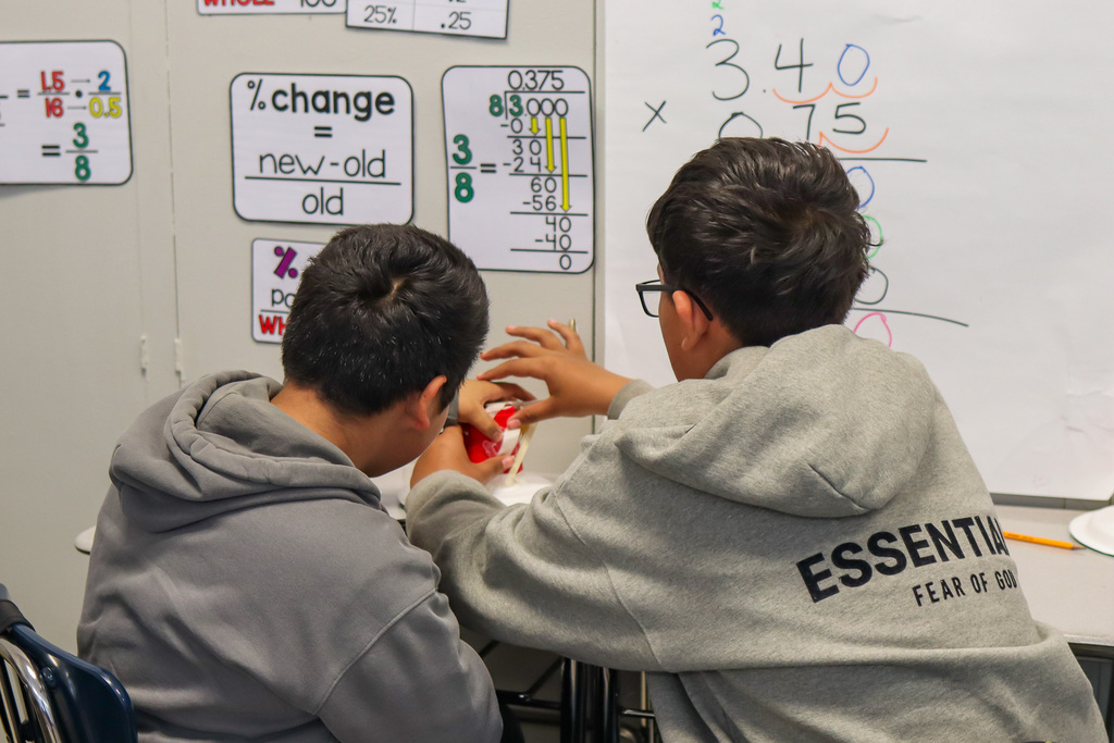 Students constructing their battle bot