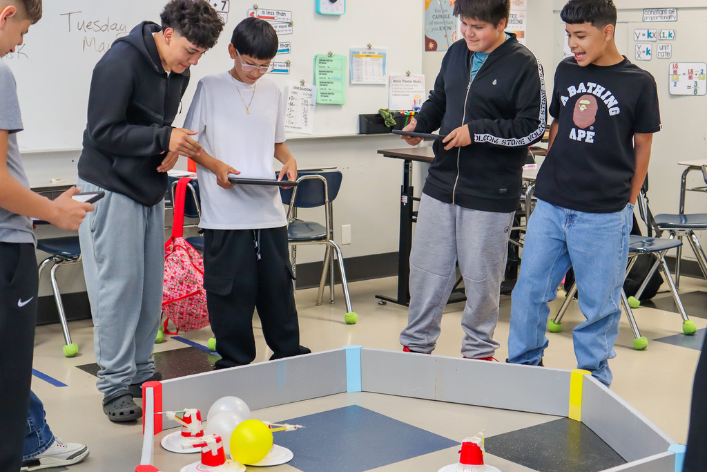 Students driving their battle bots