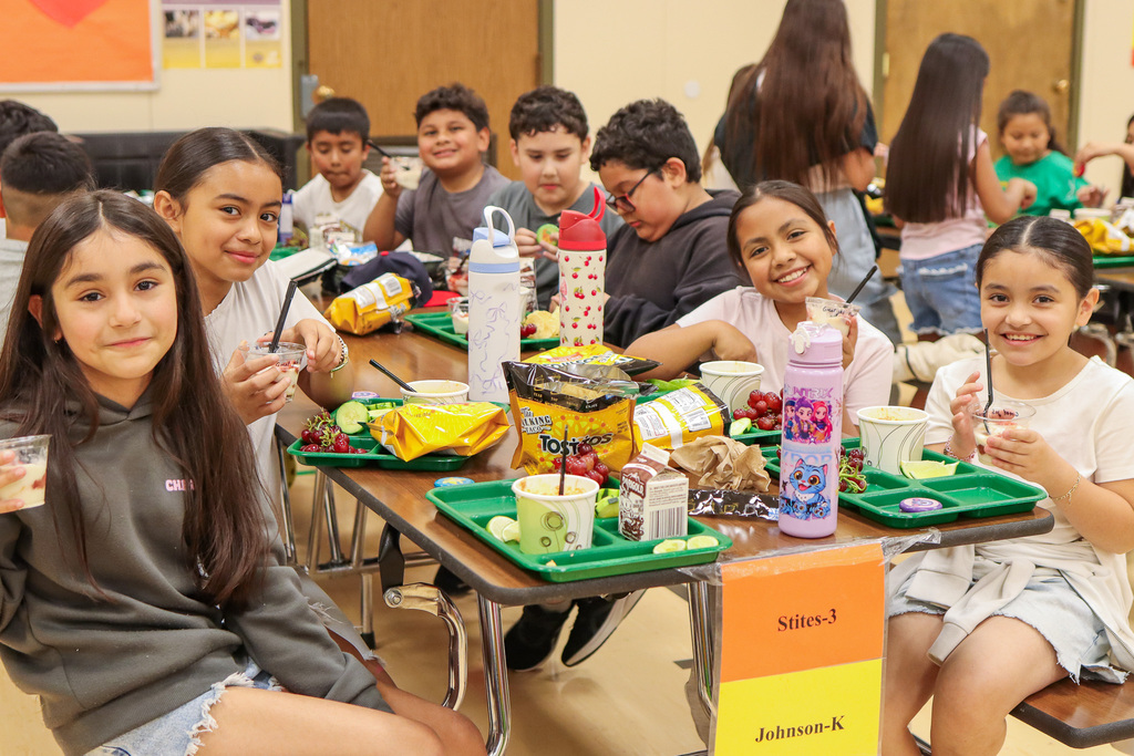 students at MHES with their prizes