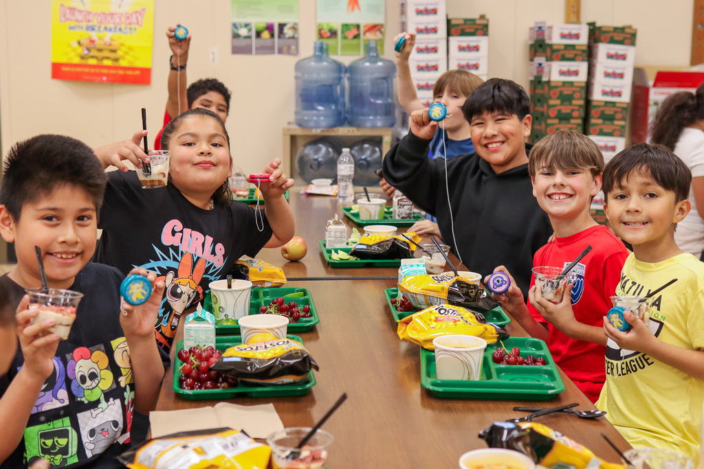 Students at MHES with their prizes