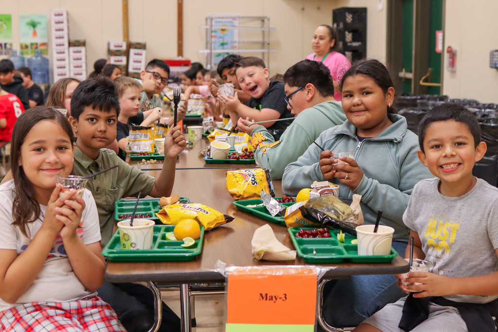 Students at MHES with their prizes
