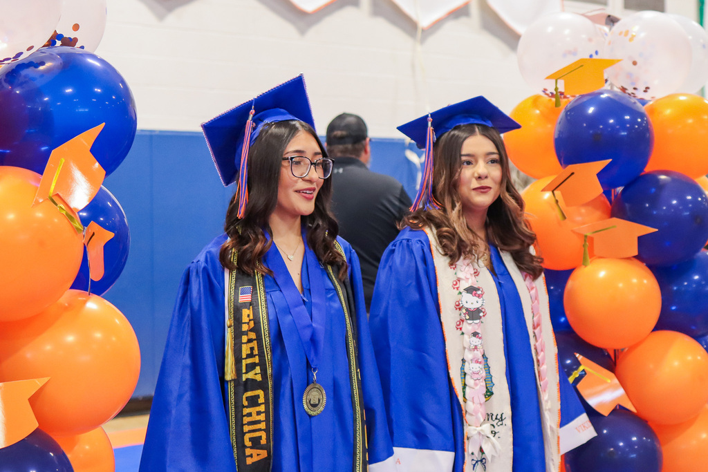 Students walking towards their seats