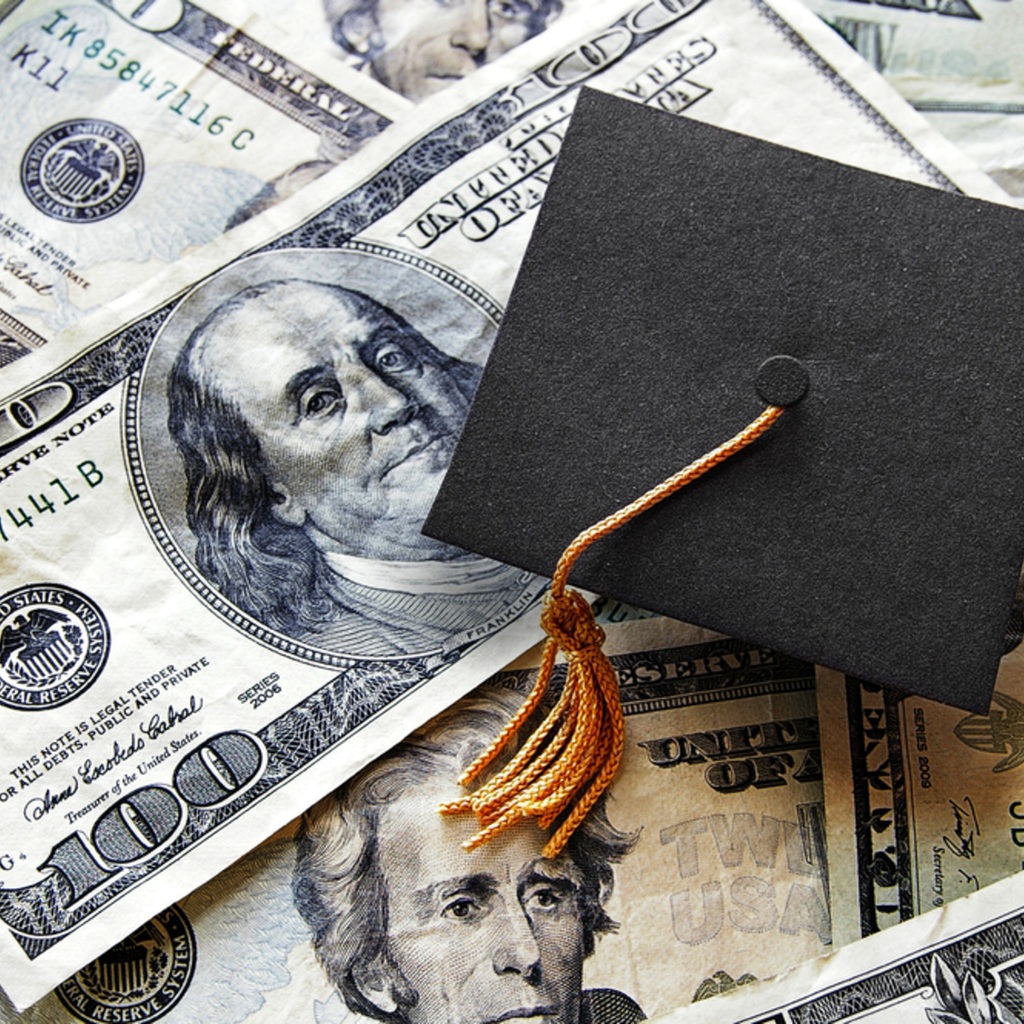 image of bank bills and diploma