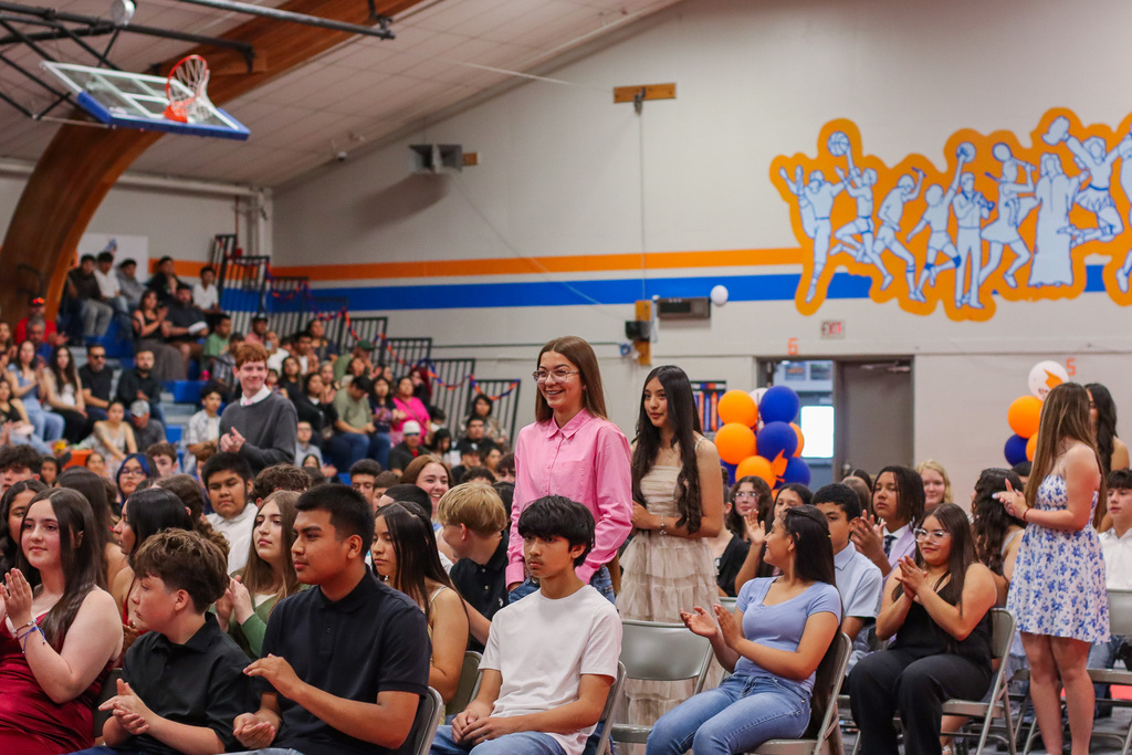 Students being recognized for receiving awards 