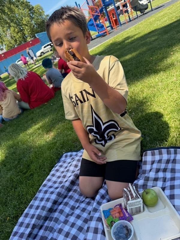 student enjoying summer meal 