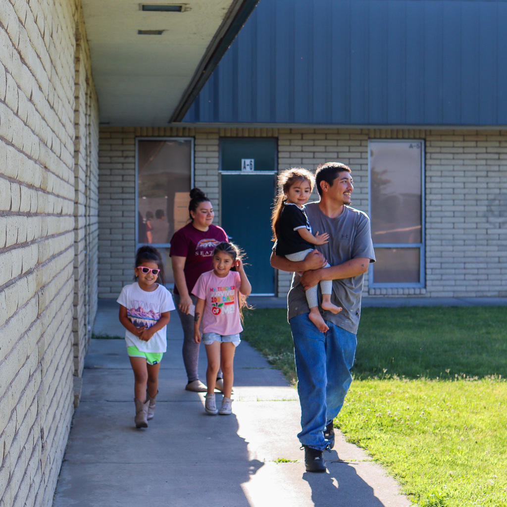 Parents walking with students to the playground