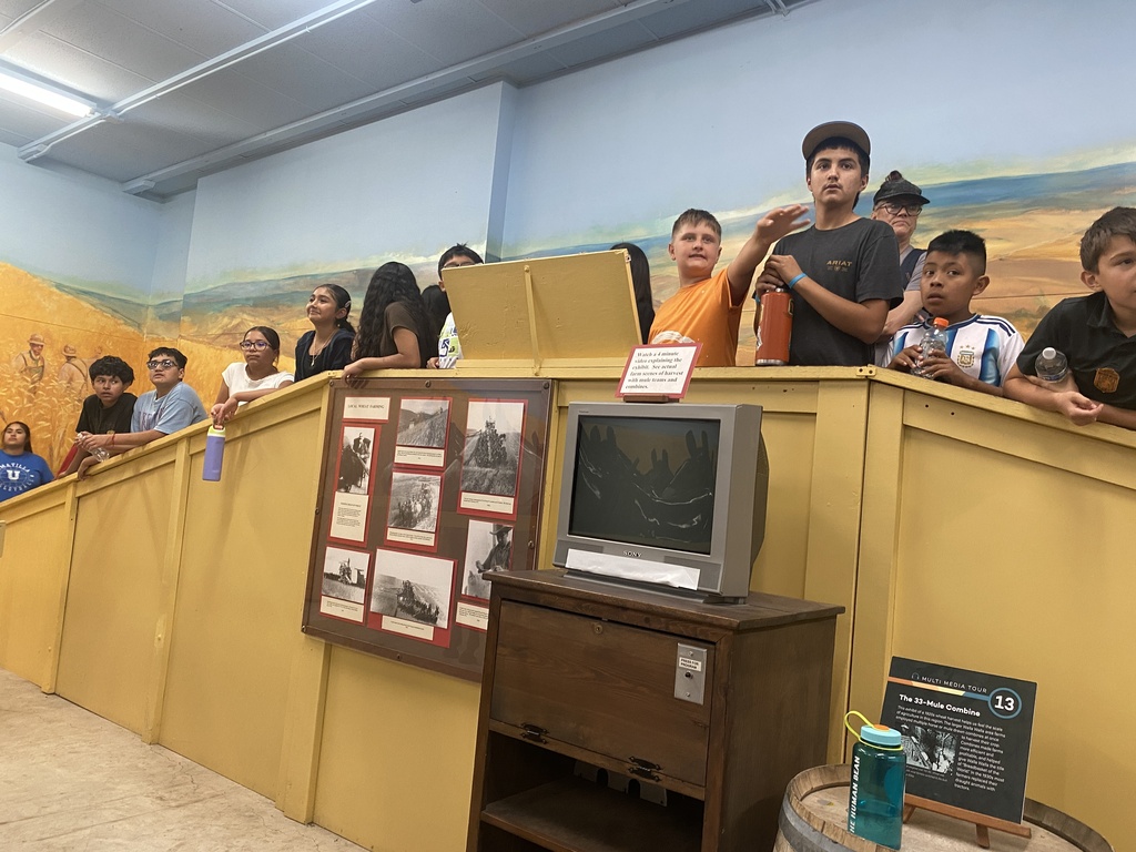 students taking tour of museum