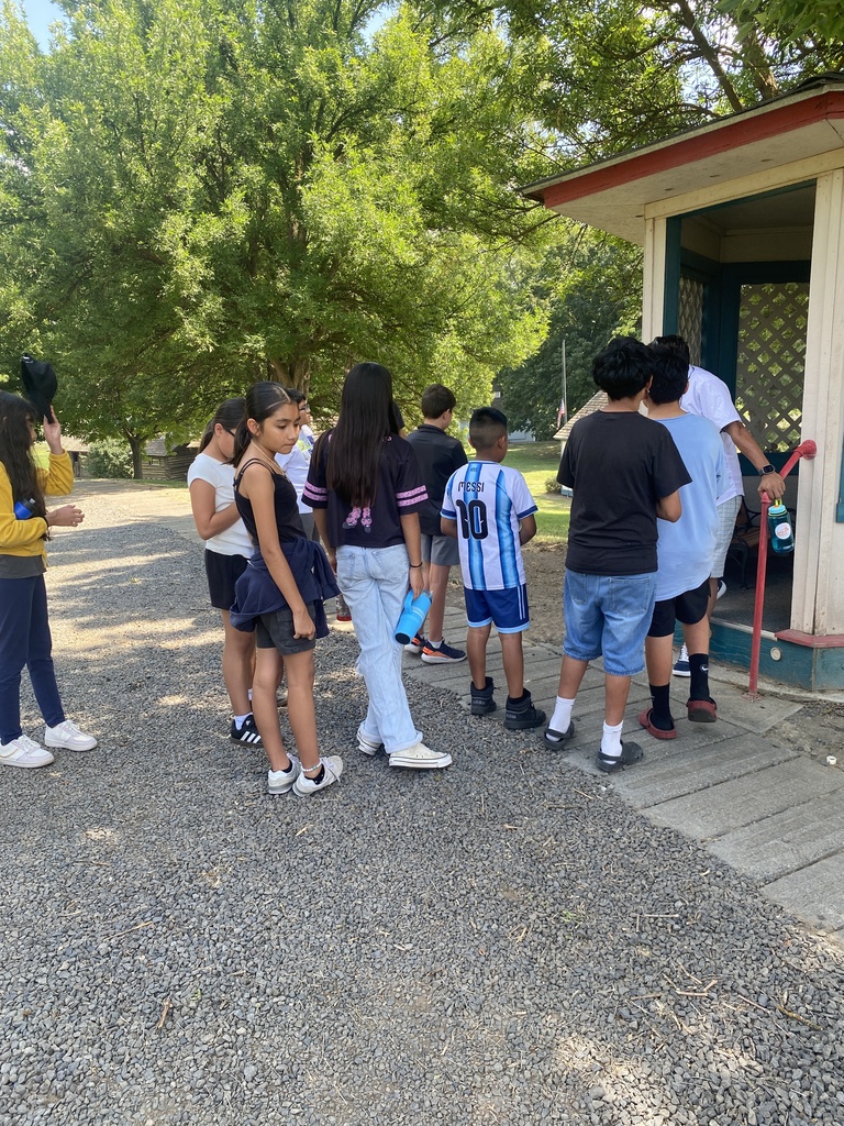 students taking a tour outside 