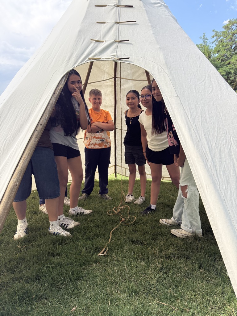 students inside of teepee