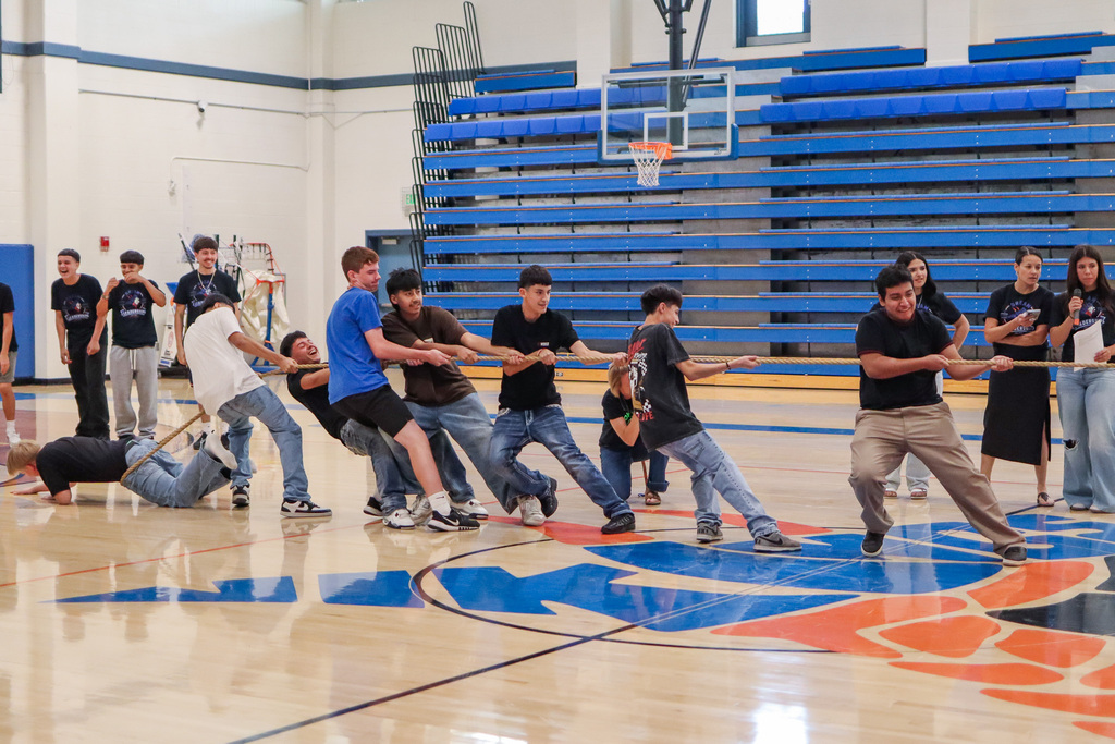 Freshman battling against each in Tug-A-War at welcome back assembly  