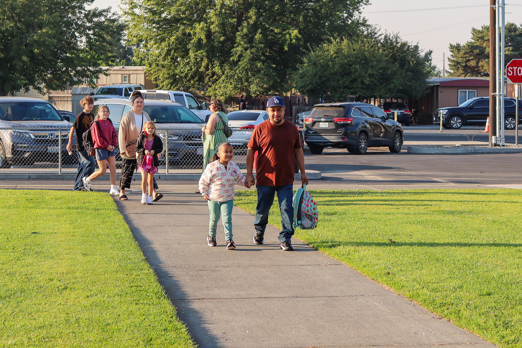 Students and families walking to classroom 