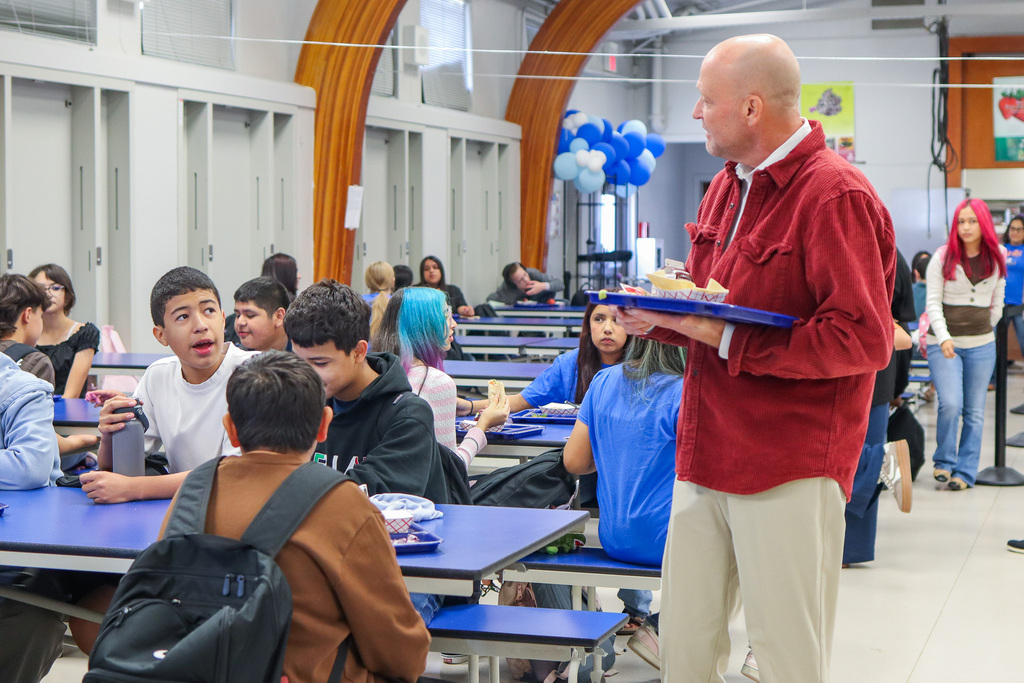 Rep. Smith grabbing lunch at Clara Brownell Middle School and speaking with students