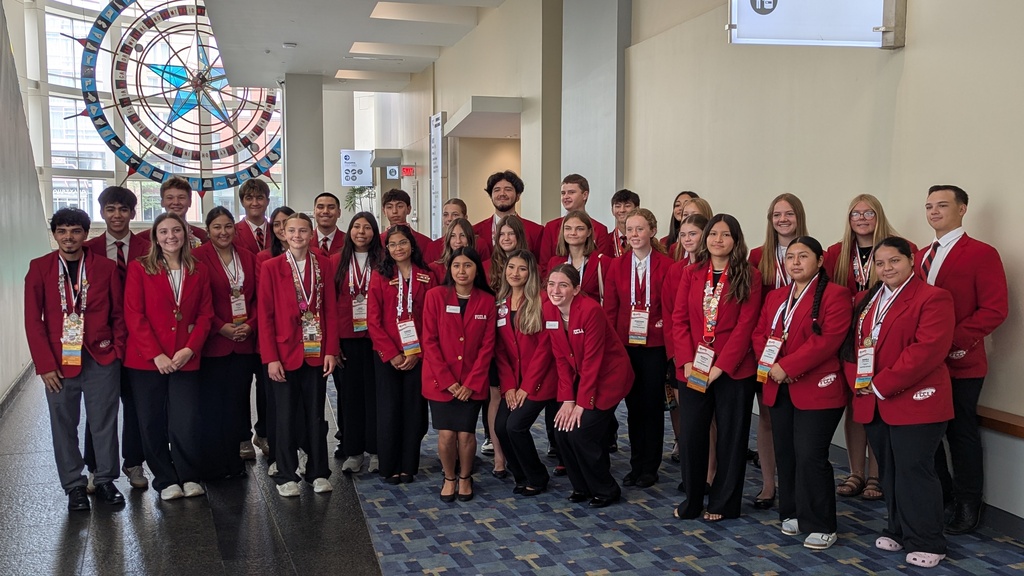 Bring group photo of UHS students with a few other competitors